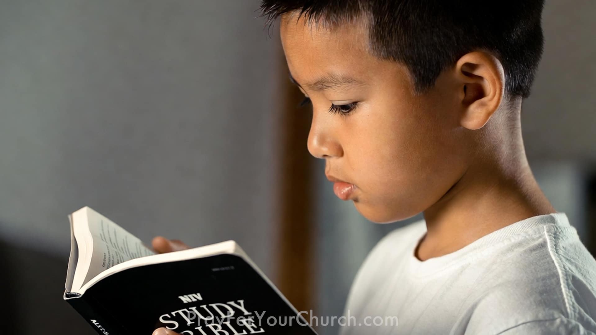 Boy Reading Bible